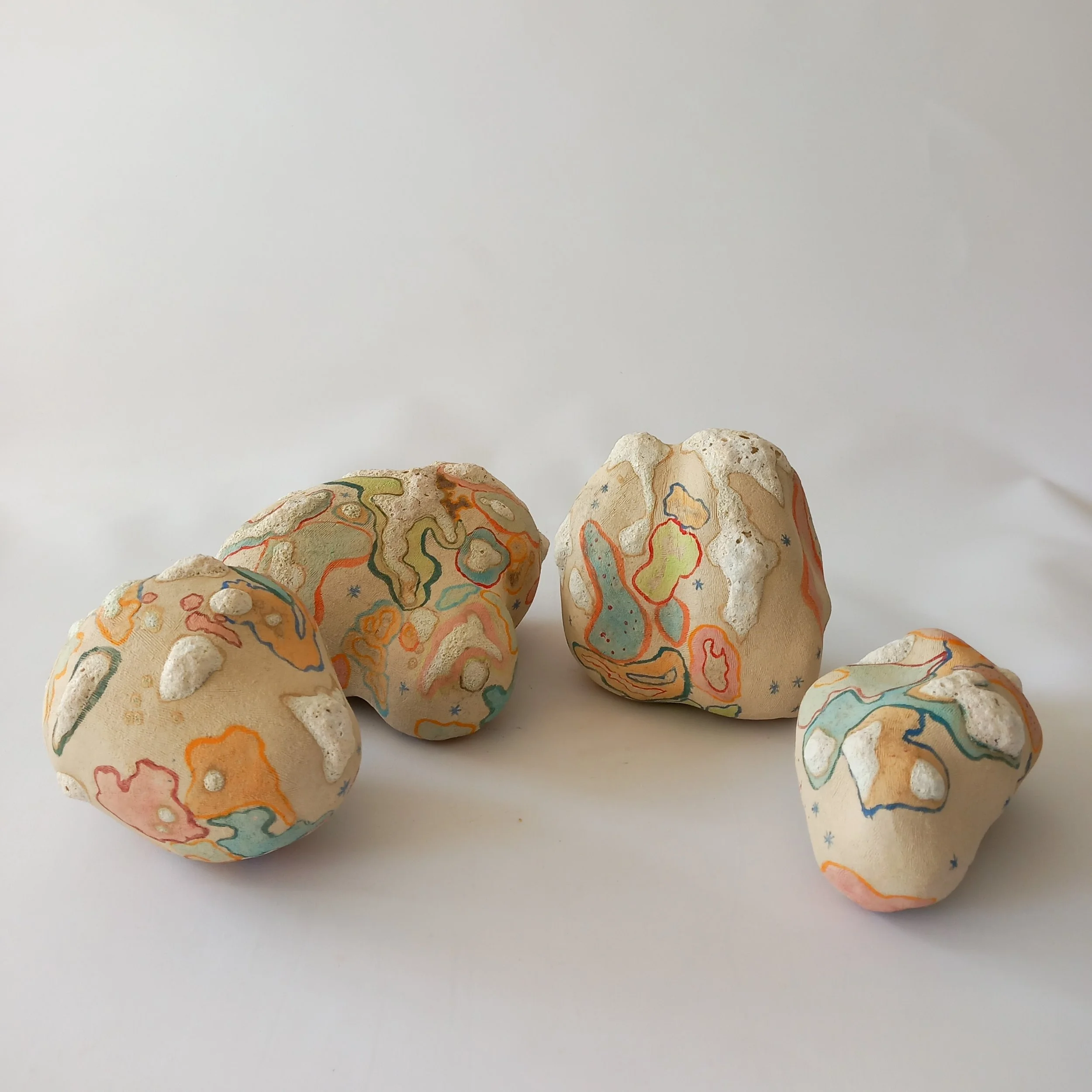 ROBERTO BURLE MARX GOES UPHILL, 2026, white stoneware with tinted slips and coloured under glazes, 18 x 12 x 13  cm; 21 x1 0 x 22  cm;   16 x 15 x 12 cm; 18 x 9 x 10  cm
