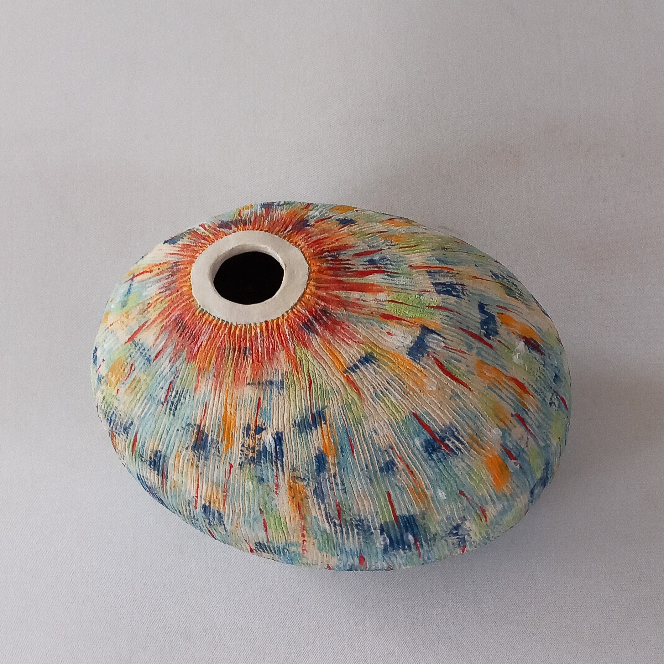 PEACOCK EGG, 2026, white stoneware, tinted slips, coloured under glazes, 20 X 11 X 12 cm