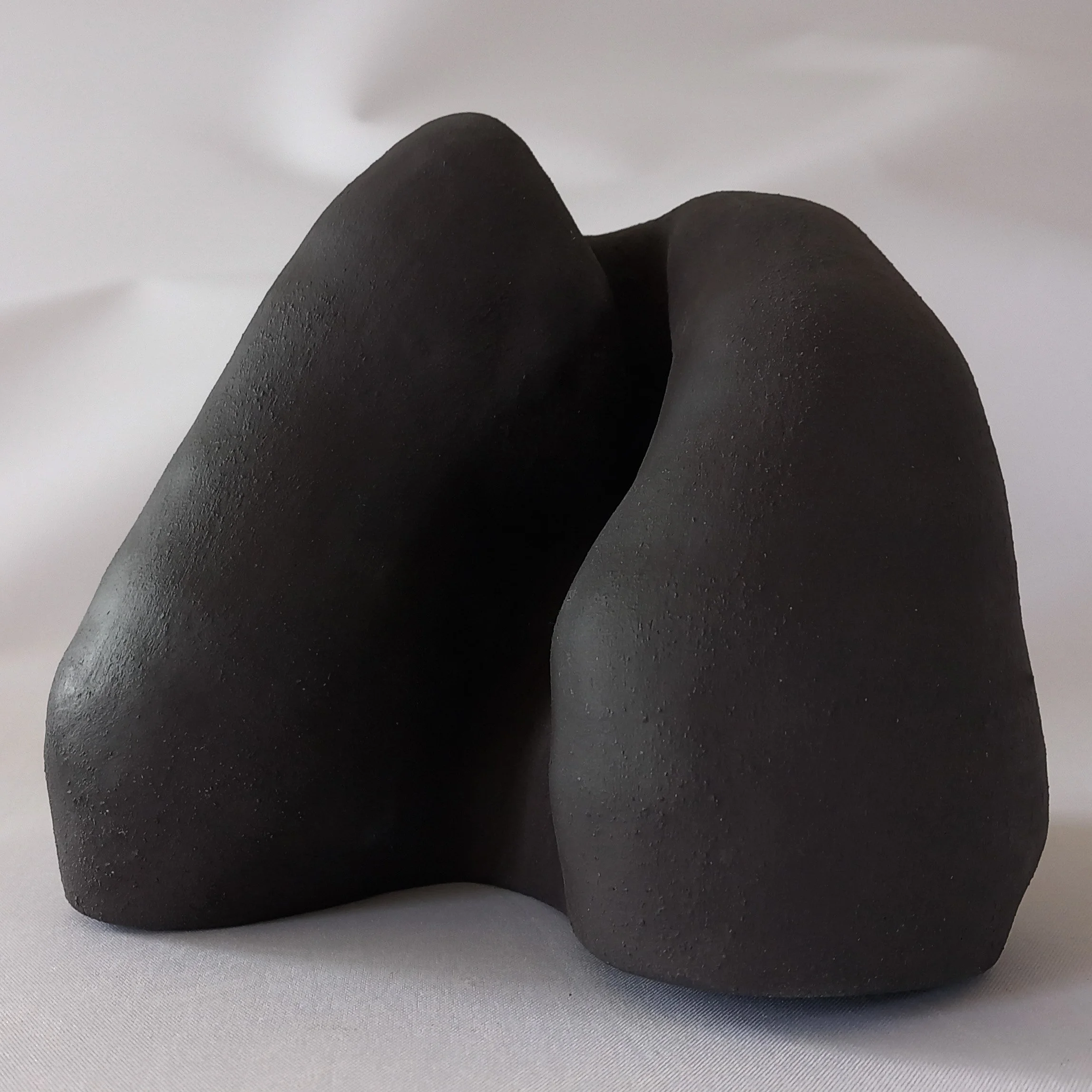 BLACK CLOCHE: BIFOLD, 2024, black stoneware, 18 X 20 X 25 CM