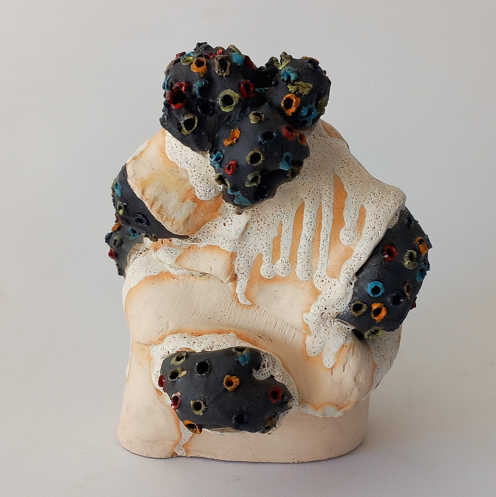 NO DESSERT, 2025, white and black stoneware, coloured under glazes, lava glaze, 15 x 18 x 14 cm