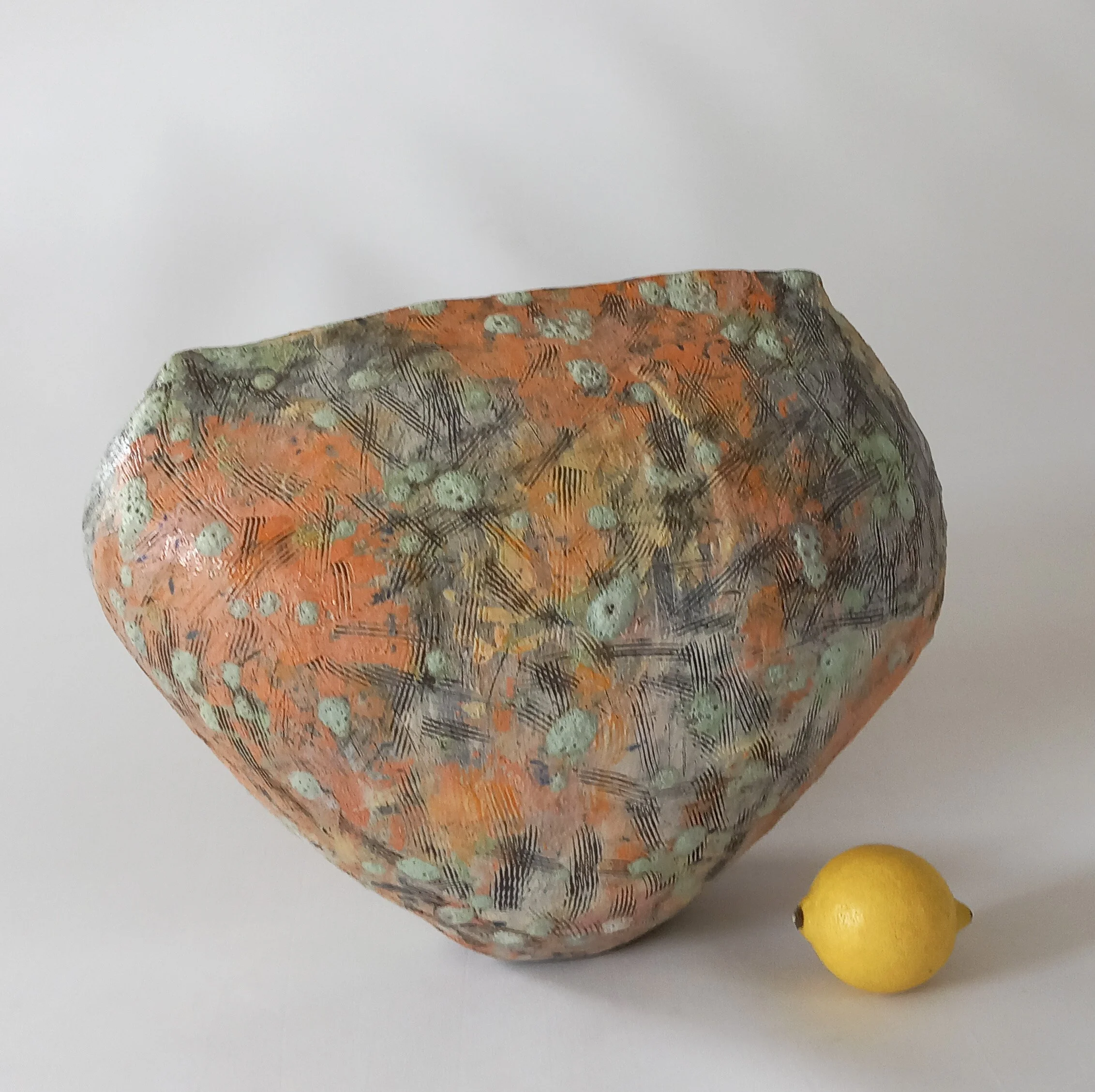 ON BALANCE,

2026, stoneware with tinted slips, under glazes, lava glaze and gloss glaze, 
 36 x 28 x 23 cm