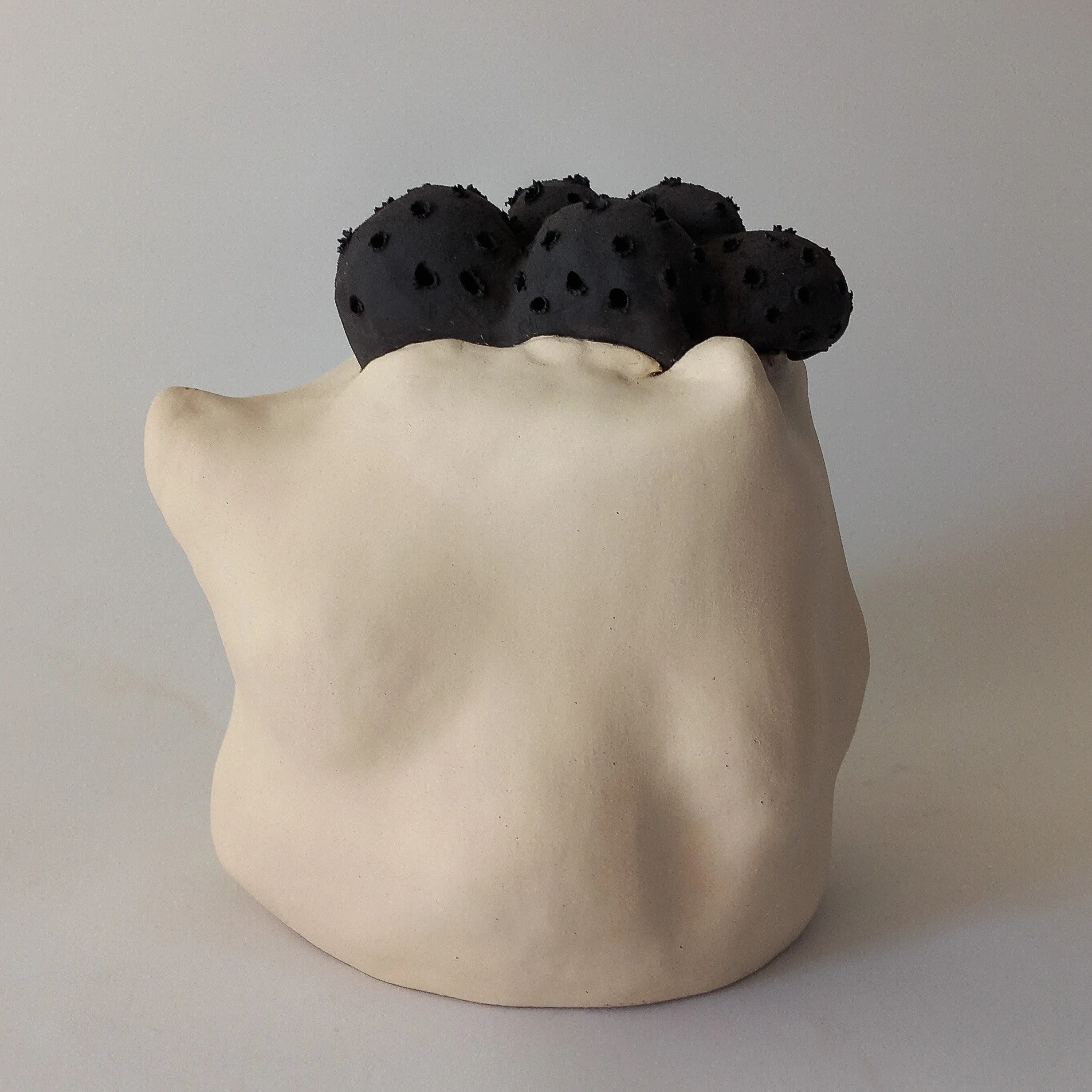 BUBBLING UP, 2025, white and black stoneware, 20 x 20 x 20 cm
