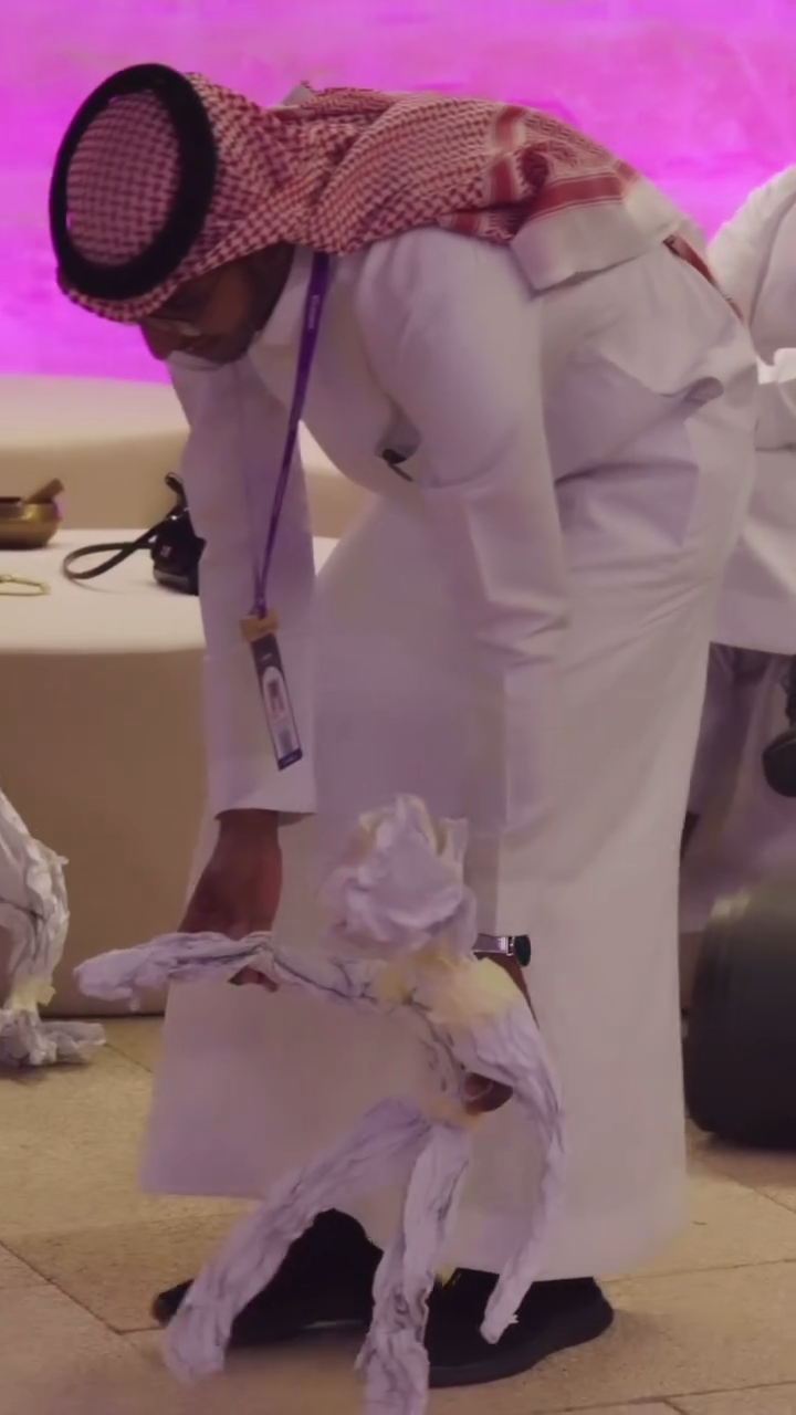 Paper puppet encounters among a large group in Saudi Arabia at a Deep Puppetry session