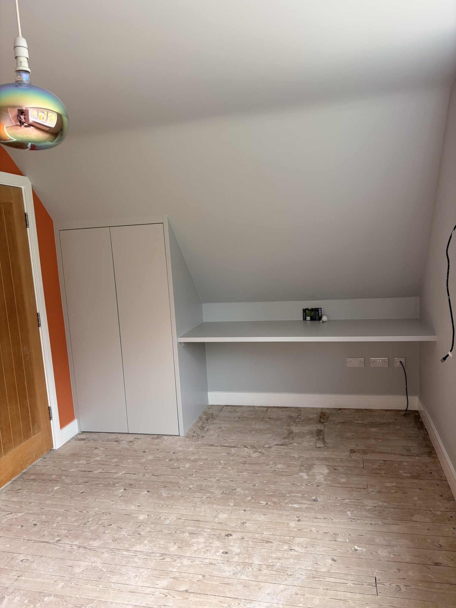 Simple built-in wardrobe and desk.