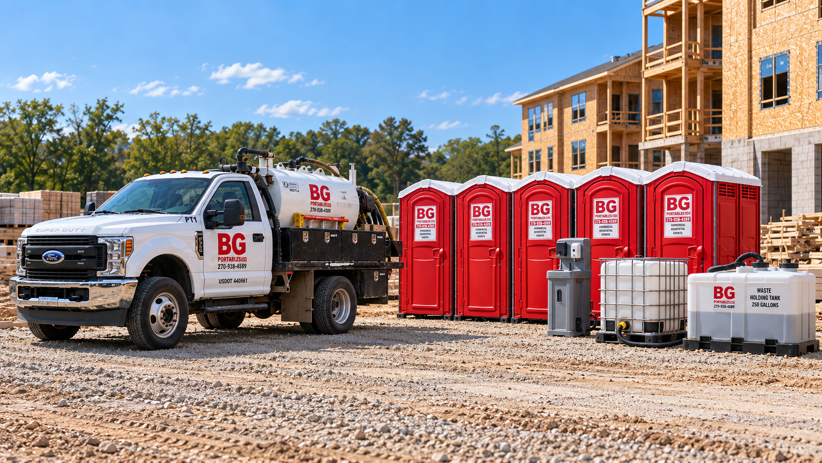 Construction site with a white BG branded truck, red portable toilets, and storage tanks near a building under construction with wood framing. Different equipment and materials are visible on dirt ground.