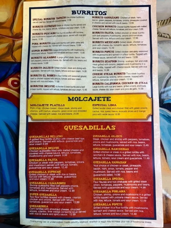 Menu featuring various burritos including special burritos, seafood, steak, shrimp, chicken, and vegetarian options, with detailed descriptions and prices.