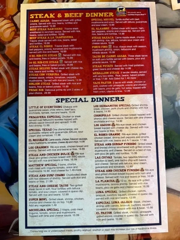 A restaurant menu featuring various steak and beef dinners, including options like Carne Asada, Beef Steak Ranchero, and Steak Fajita, with descriptions and prices listed.