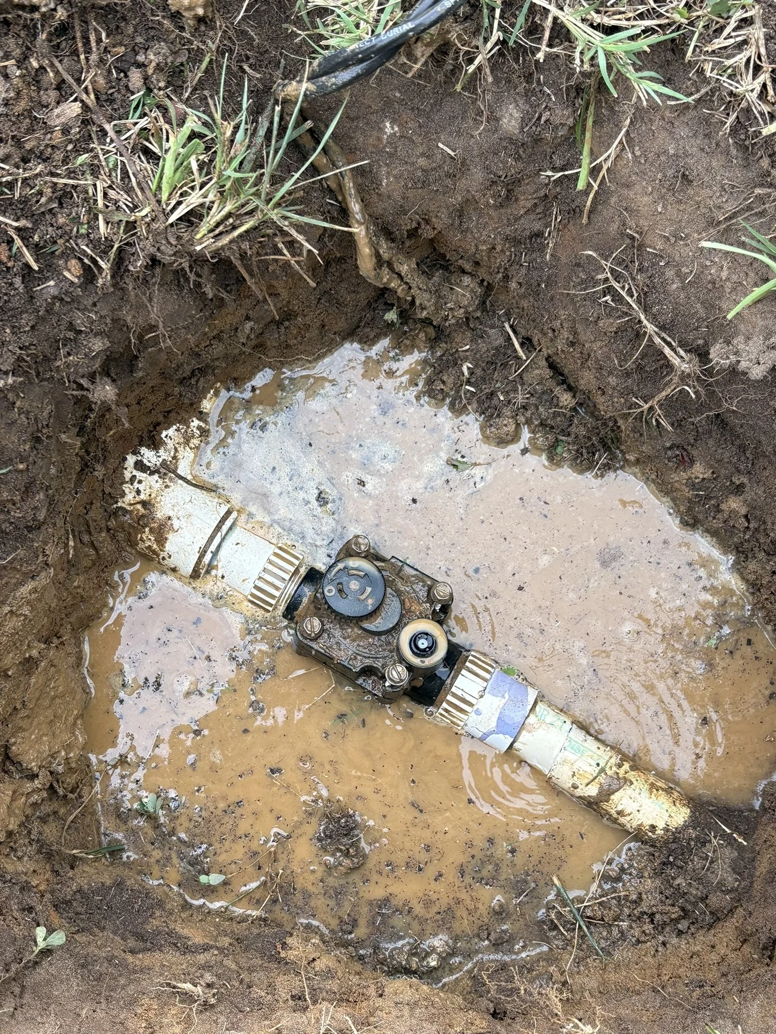 Damaged valve assembly before replacement.