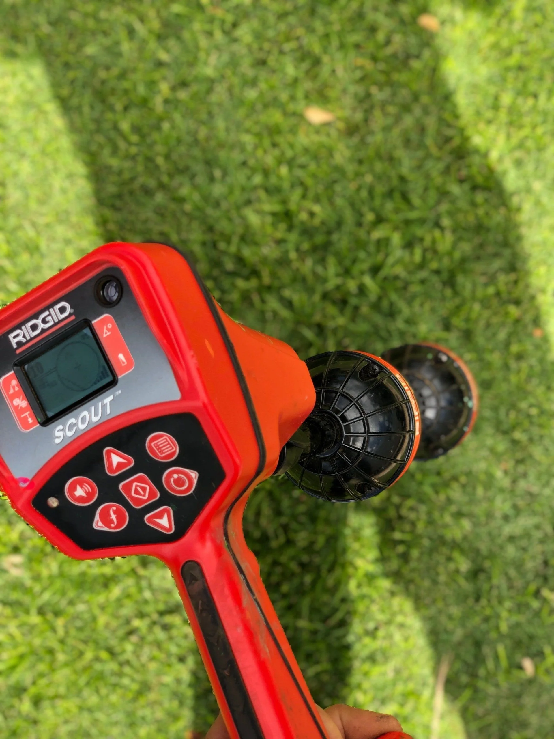 Handheld camera locator display used to trace underground plumbing