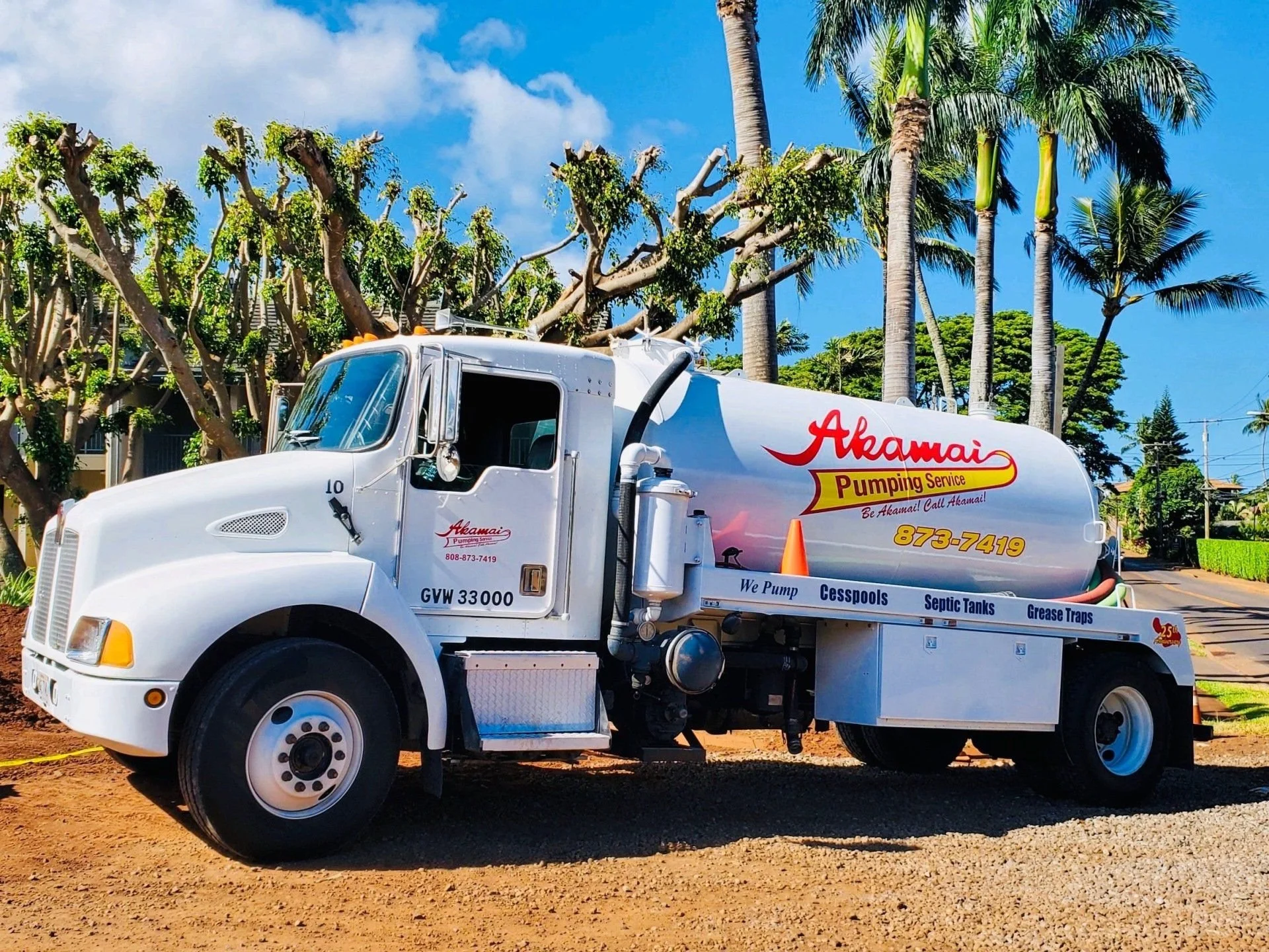Front view of an Akamai Pumping Service truck.