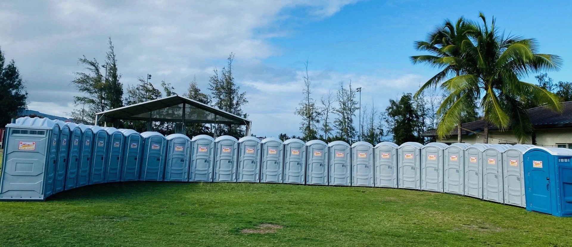 A row of portable toilets at an event