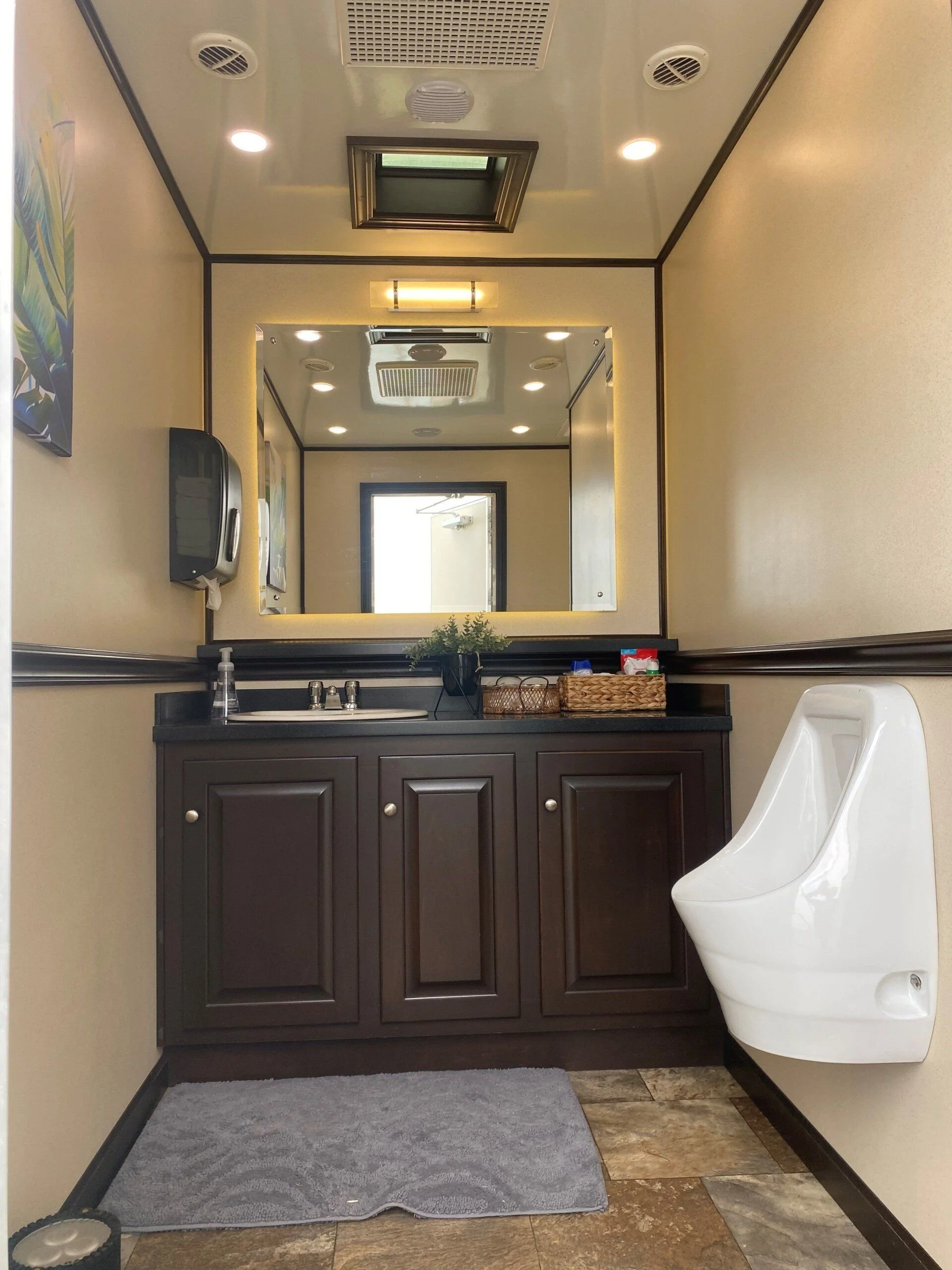 Vanity and sink area in an event restroom trailer