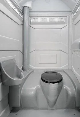 Interior of a standard portable toilet.
