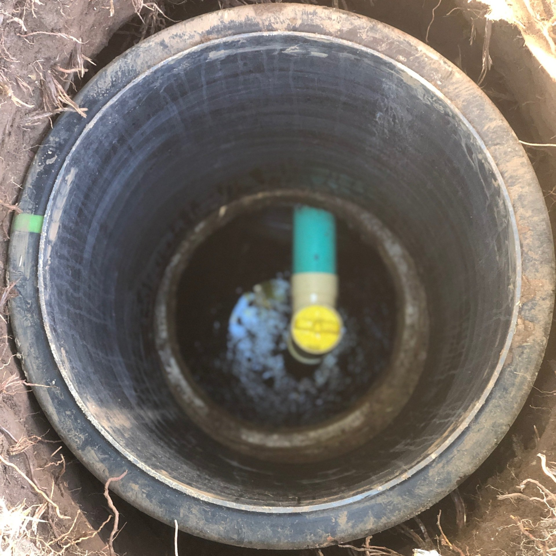 View through a riser toward the pipe below.