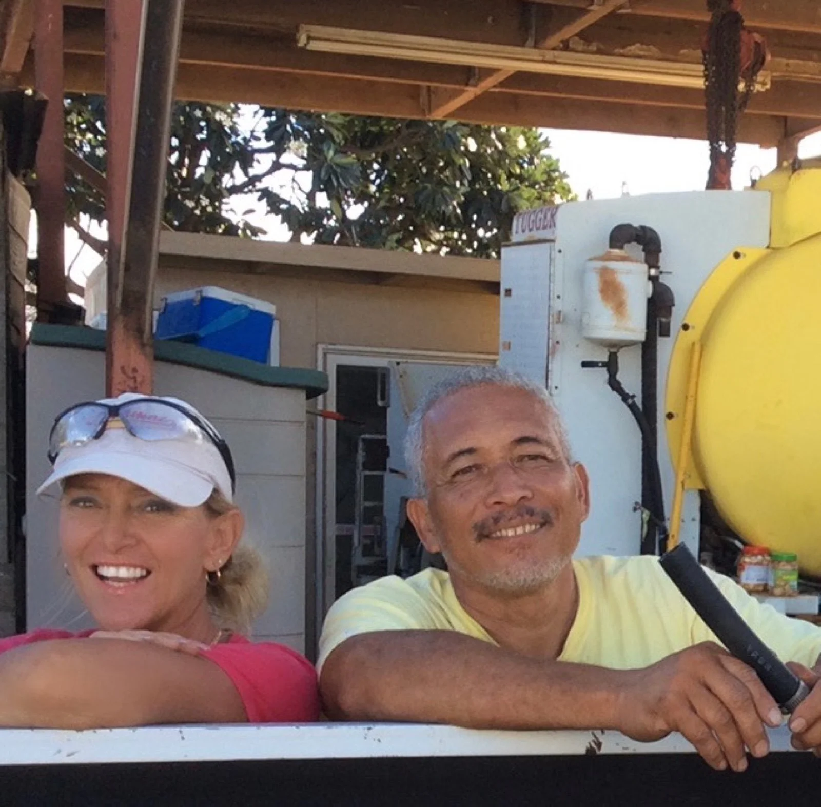 Two smiling members of the Akamai team.