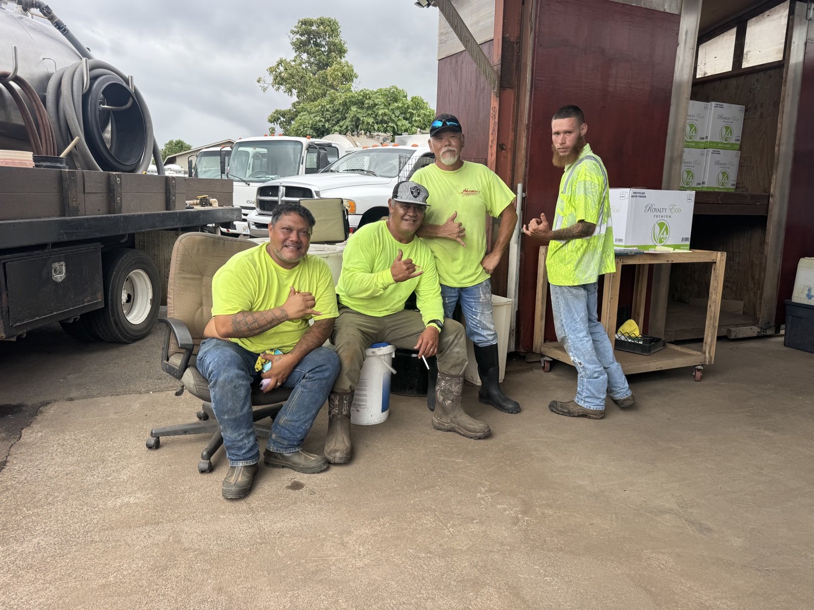 Four members of the Akamai crew together in the yard.