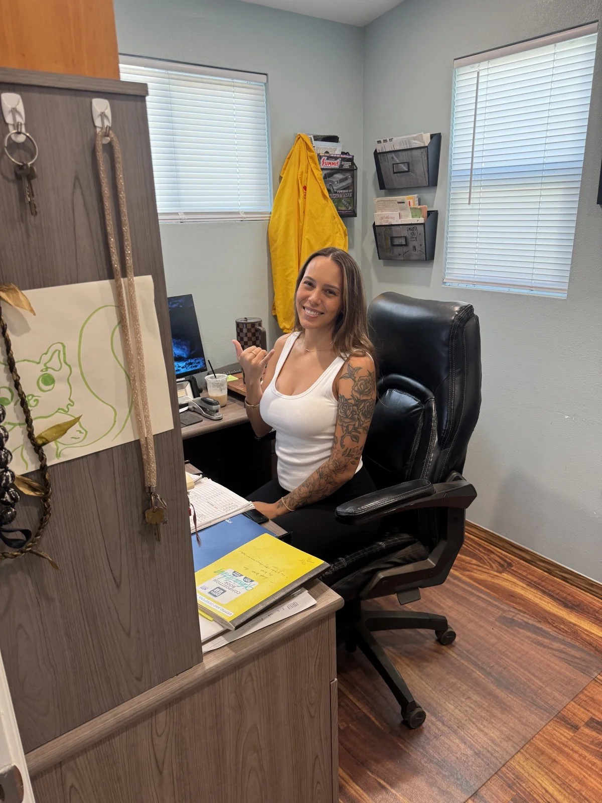 Akamai team member at her office desk.