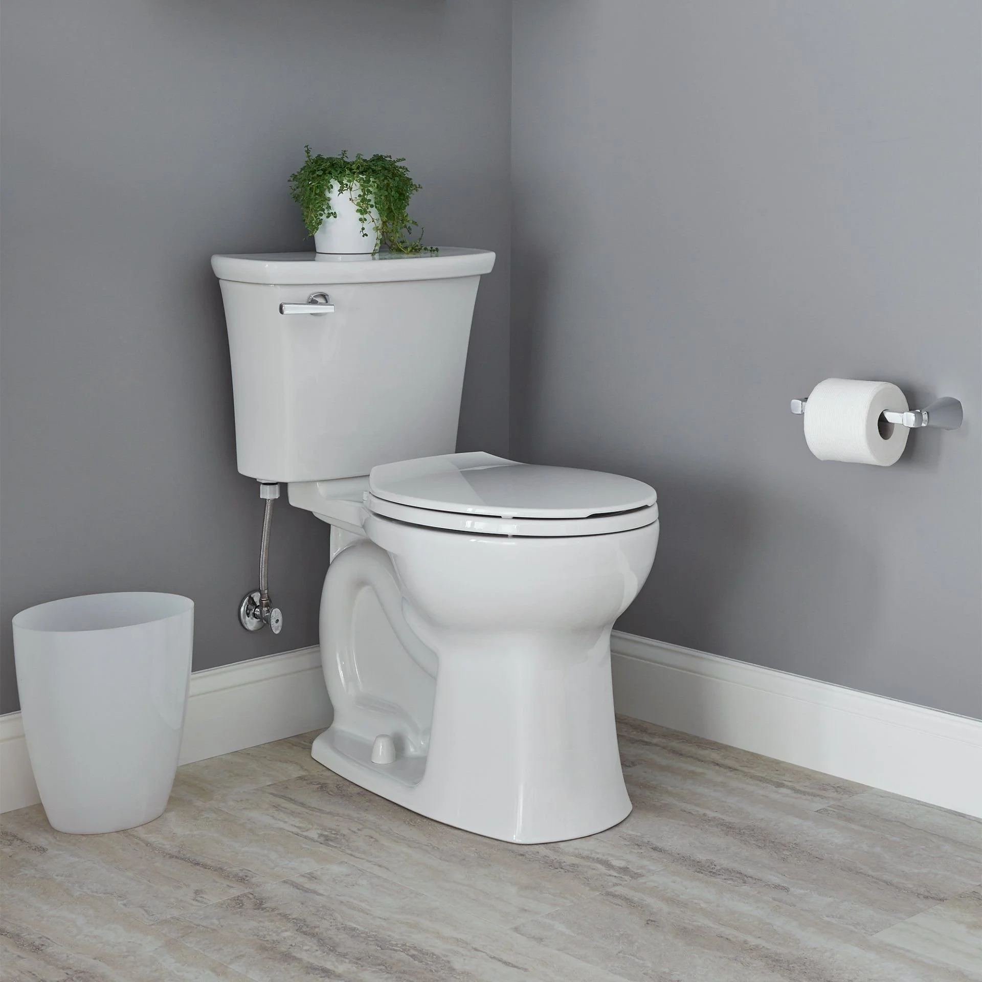 Toilet fixture shown in a clean indoor setting.