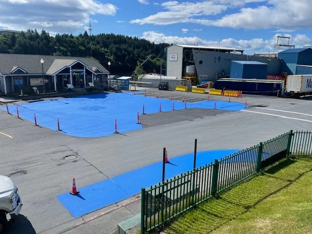 Art project for City of Kodiak.  Road painting, Kodiak AK.