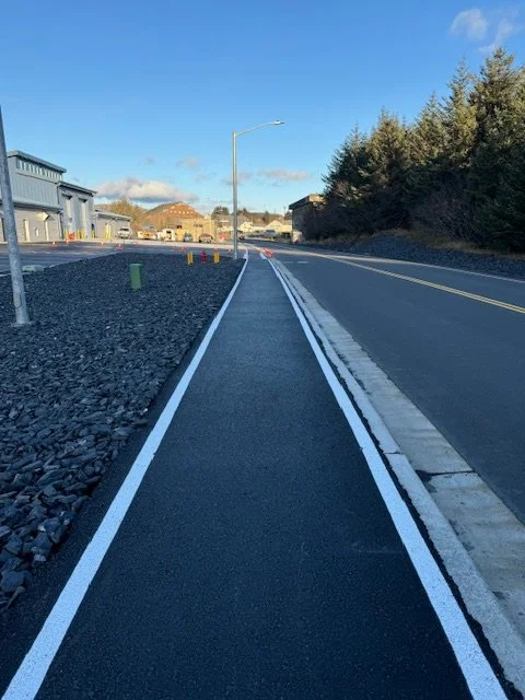 A newly painted bike lane / pedestrian path on USCG Base Kodiak 