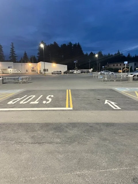 Parking lot restripe at Kodiak Walmart.