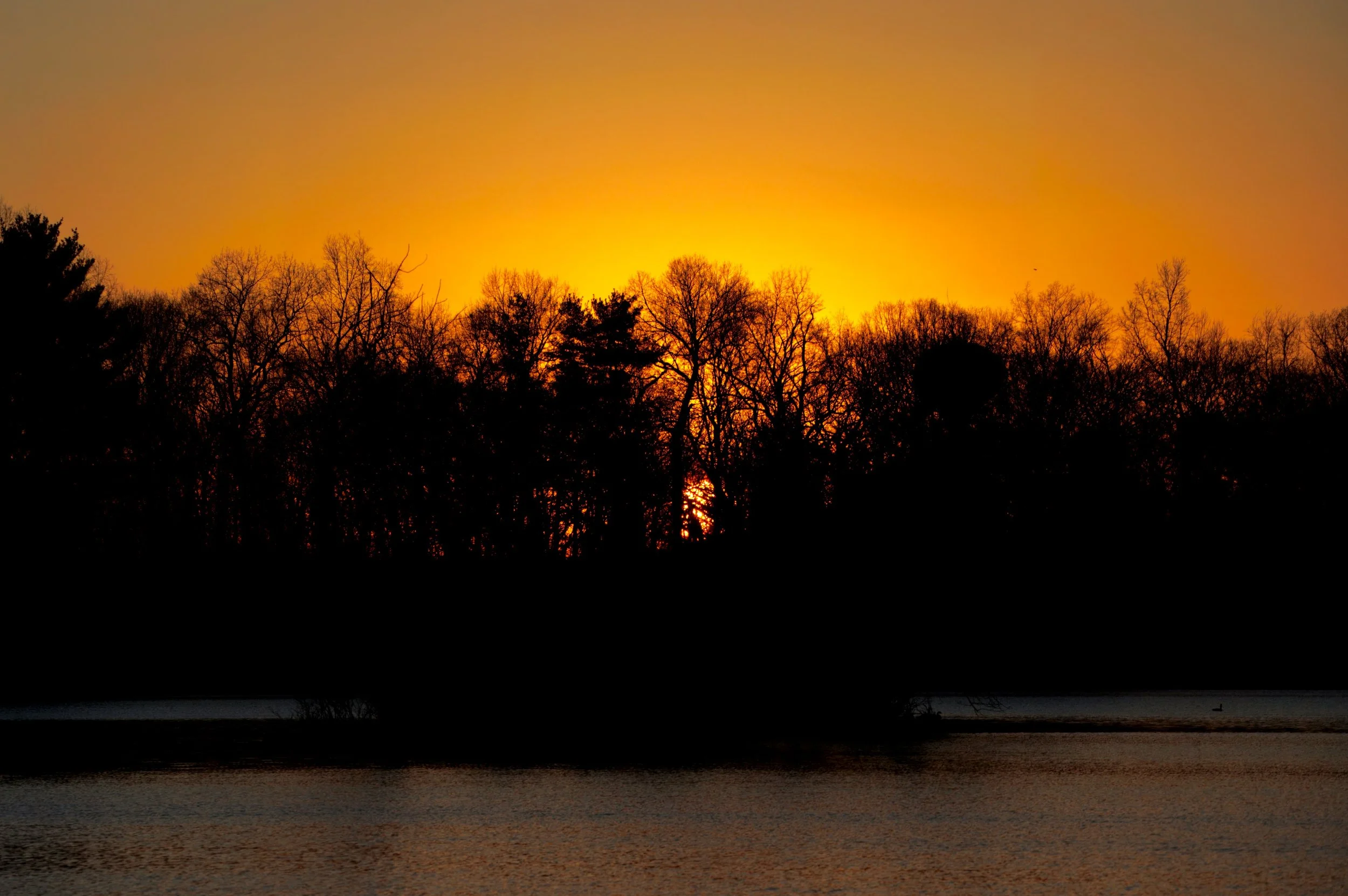 Sunset-Behind-An-Island.jpeg