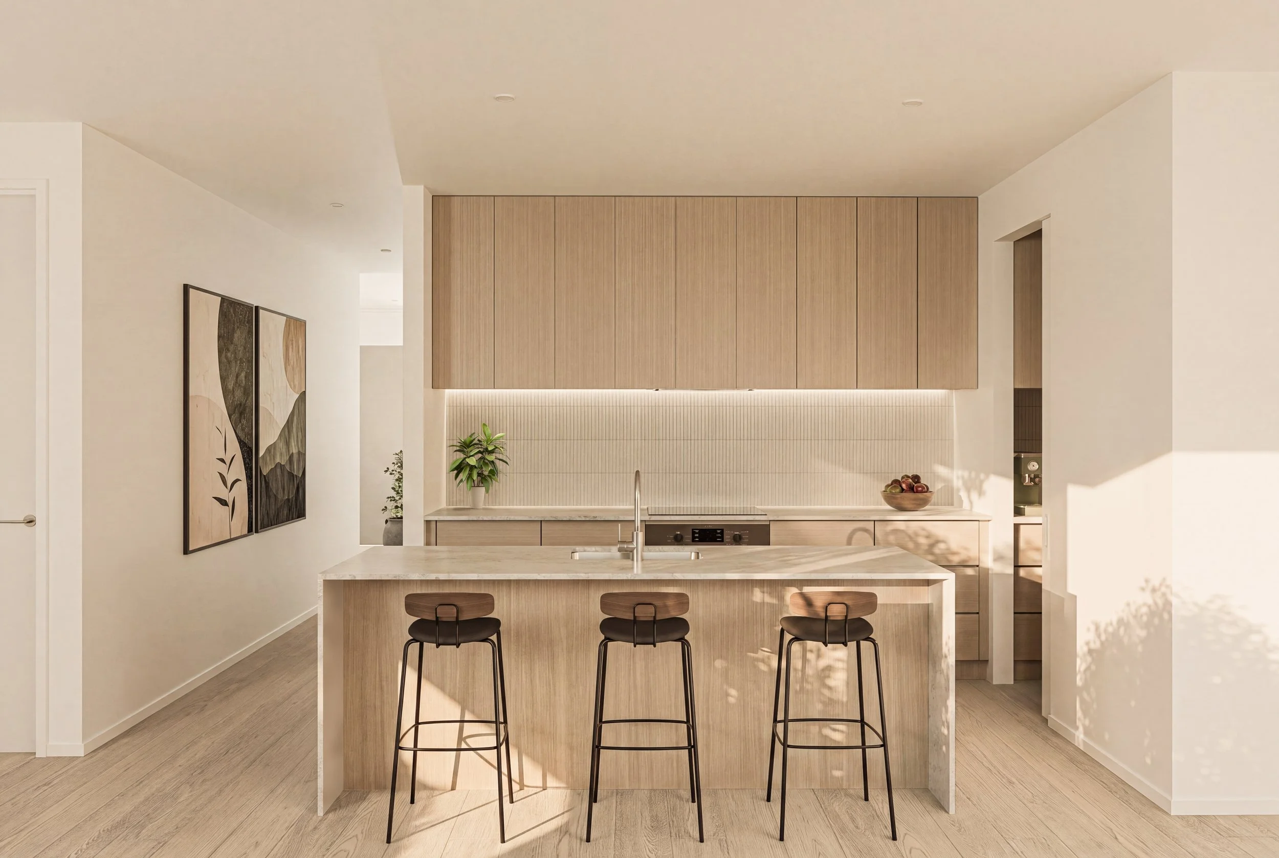Modern minimalist kitchen with light wood cabinets, a white marble island with three black bar stools, and wall art featuring mountains and leaves.