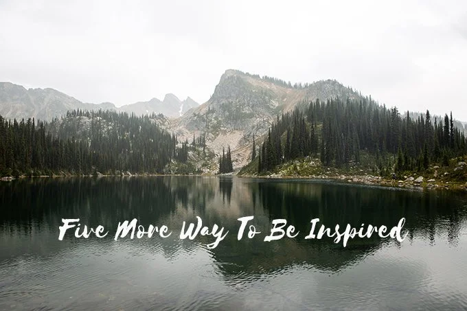 A scenic view of a mountain lake surrounded by pine trees with mountains in the background, overlaid with the text "Five More Ways To Be Inspired."