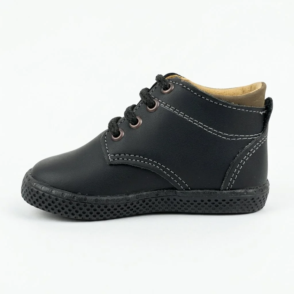 Black leather lace-up ankle boot with contrast stitching and textured rubber sole