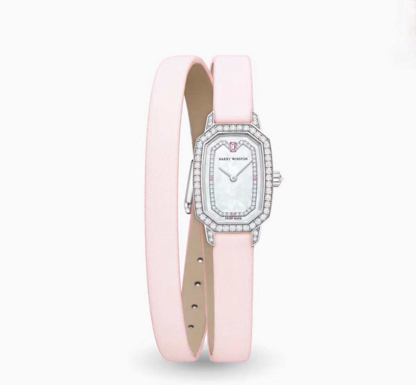 A luxury watch with a rectangular face surrounded by diamonds, on a pink strap.