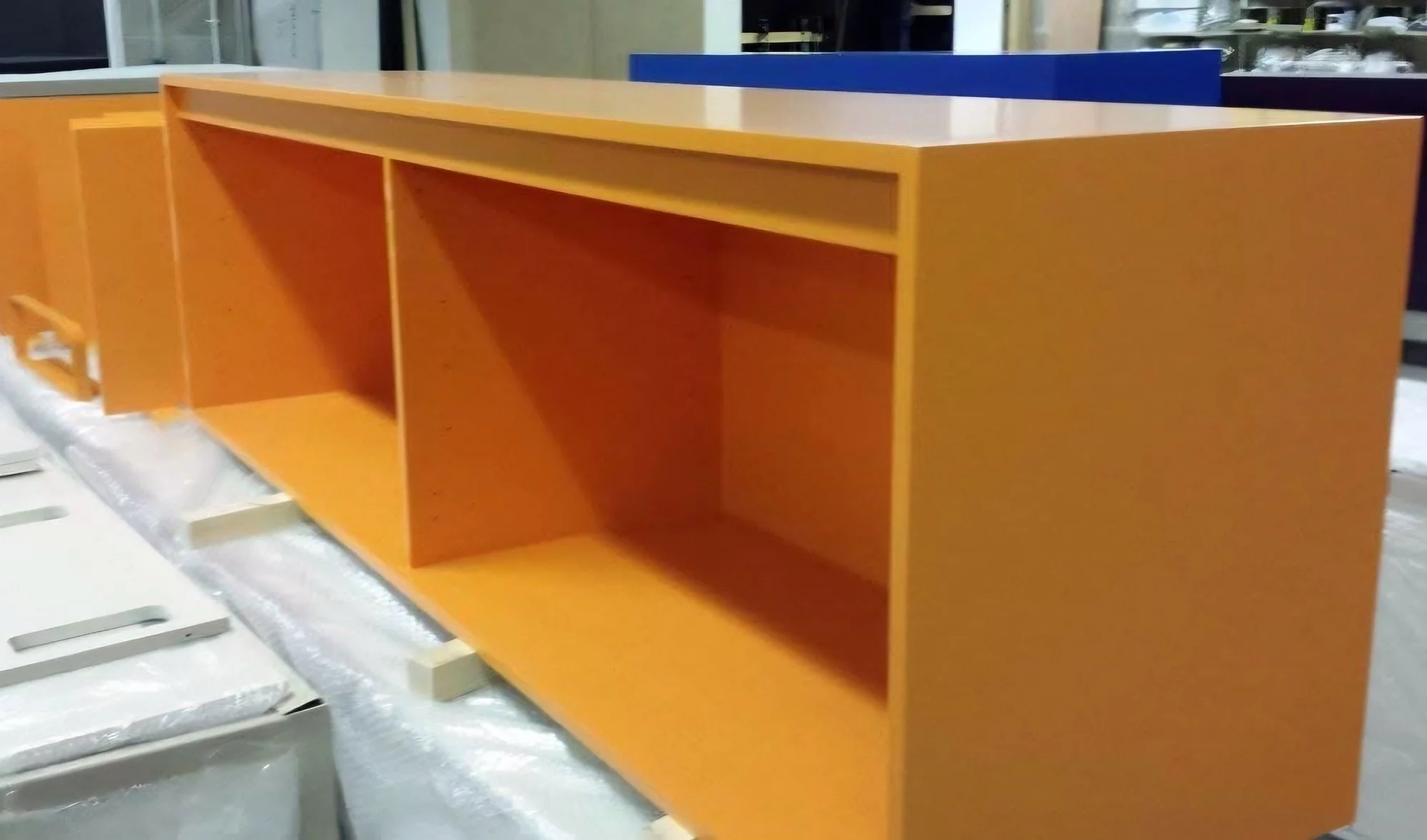 Open unit sprayed in bright orange
