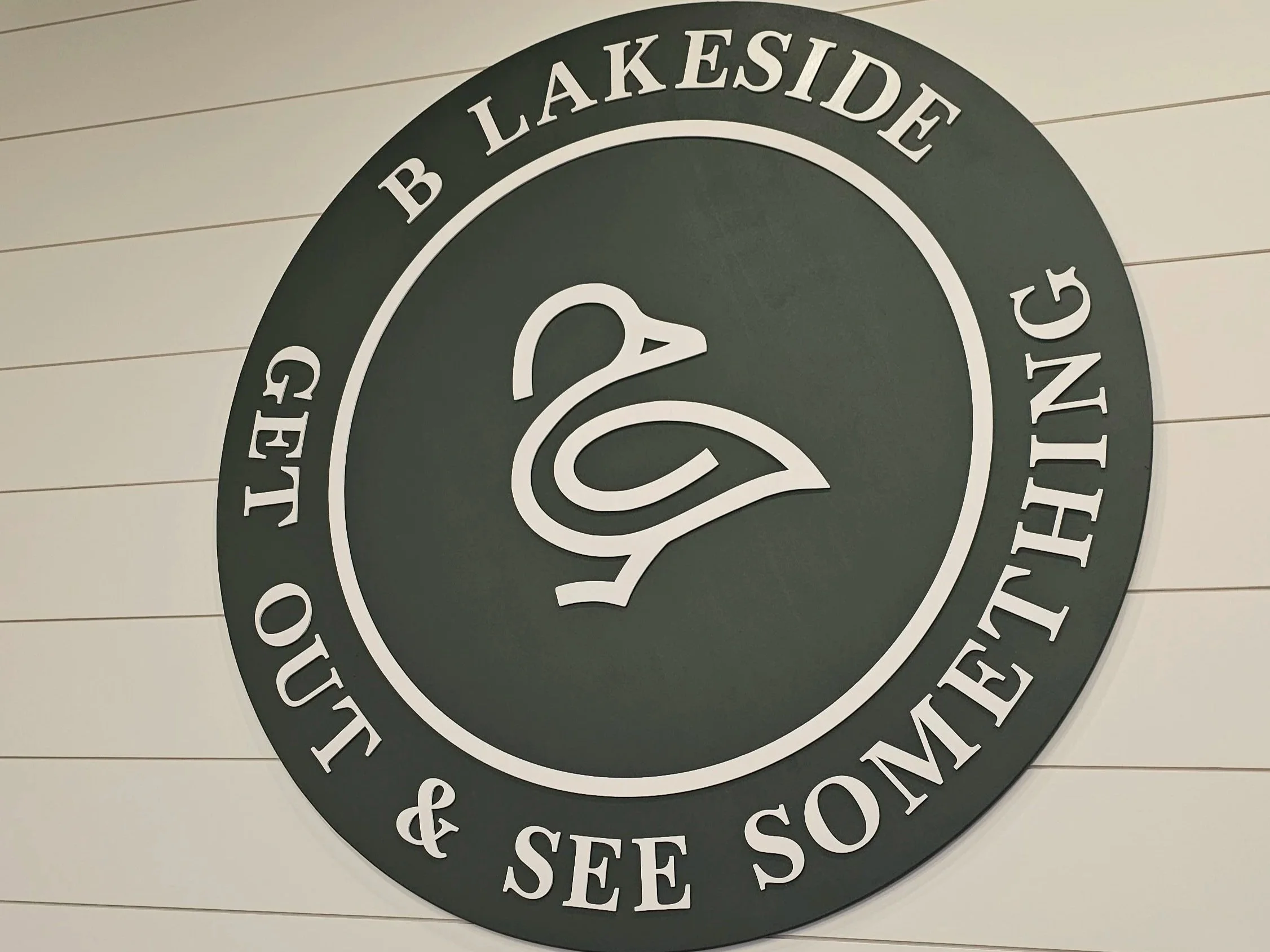 A custom sign for a local outfitter & ice cream shop in Seneca, SC