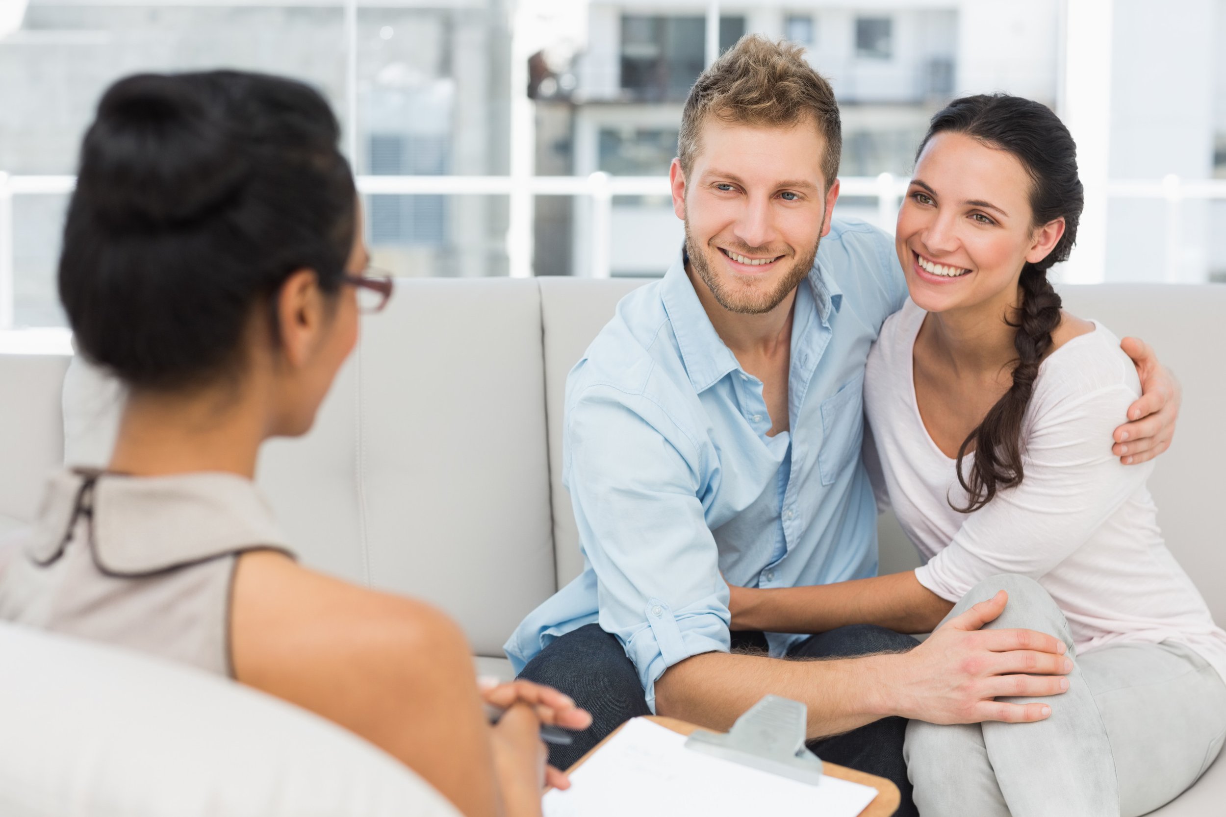 Maribel Dugas, LCSW, Zen & Health,  man and woman couple taking a therapy session together, happy couple in couples therapy
