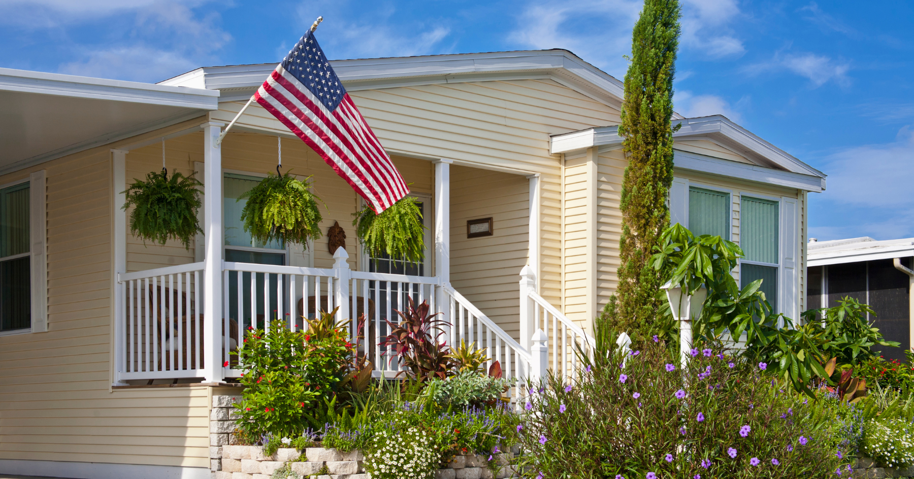 Manufactured home community with American Flag out front