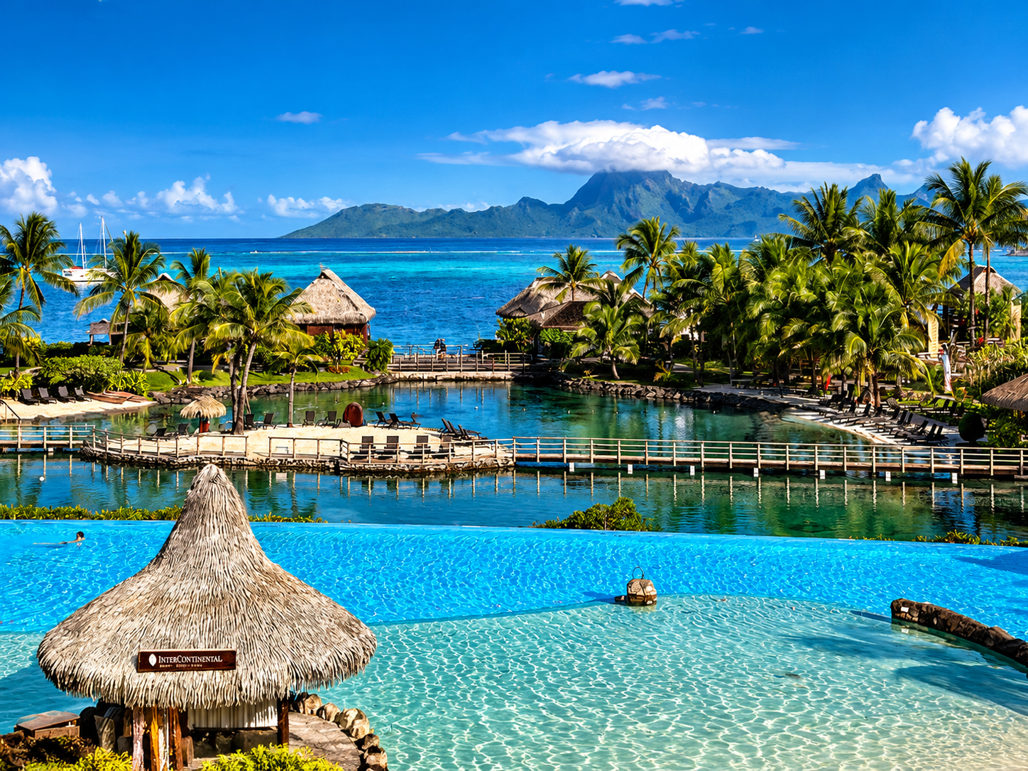 InterContinental Tahiti lagoon pool with Moorea on the horizon