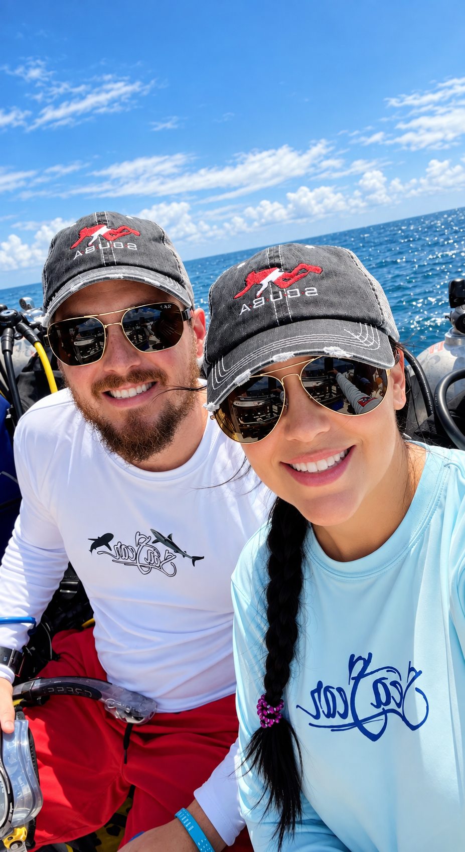 Stephanie and her husband taking a selfie on a dive boat in Key Largo