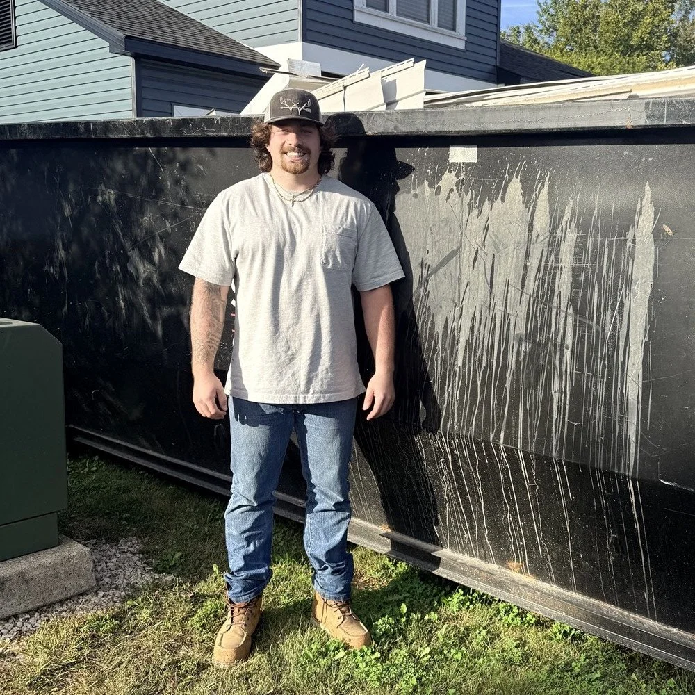 Demo Dynamikz owner Kaleb filling a 20 yard dump for a client in Imperial, MO