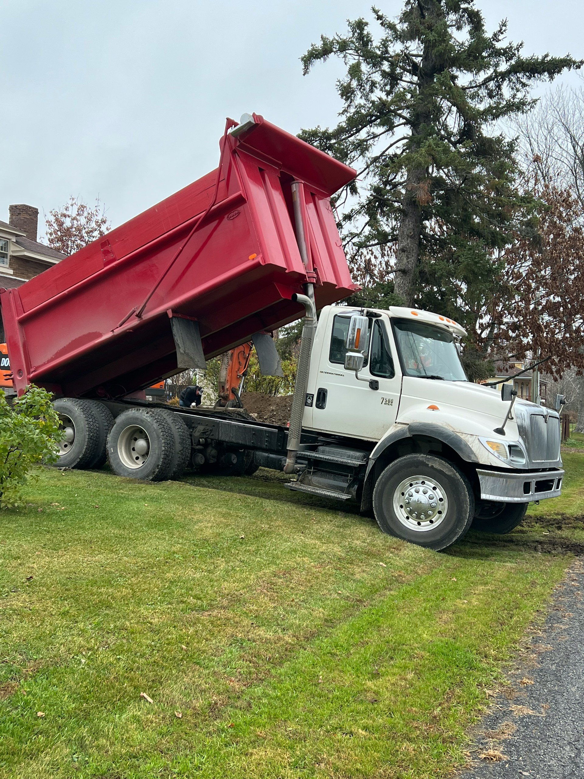 A scissor truck used for hauling demolition debris away from job sites
