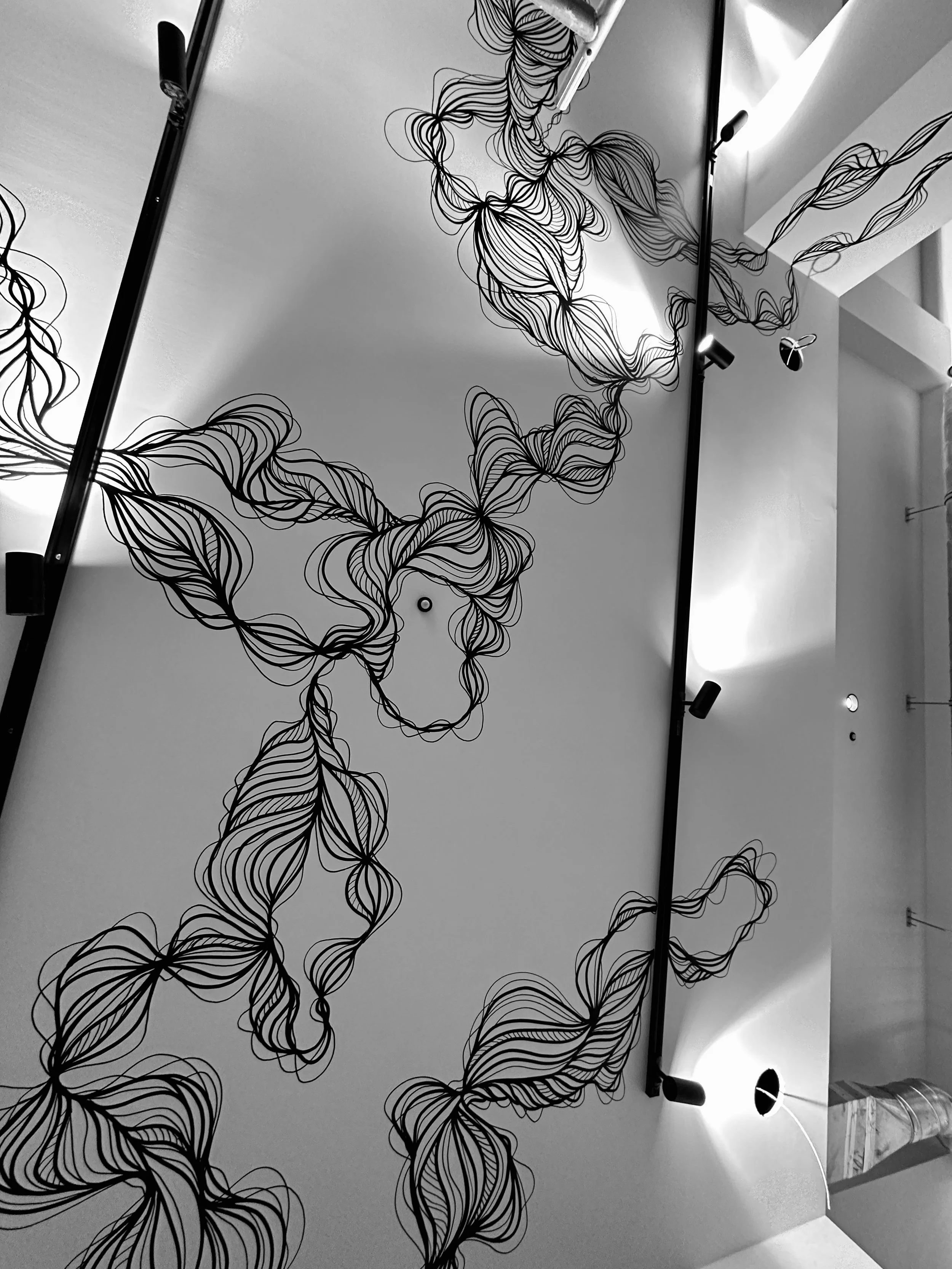 Fresque murale réalisée par Stéphanie Fontaine pour le plafond d'un co-working à Bruxelles