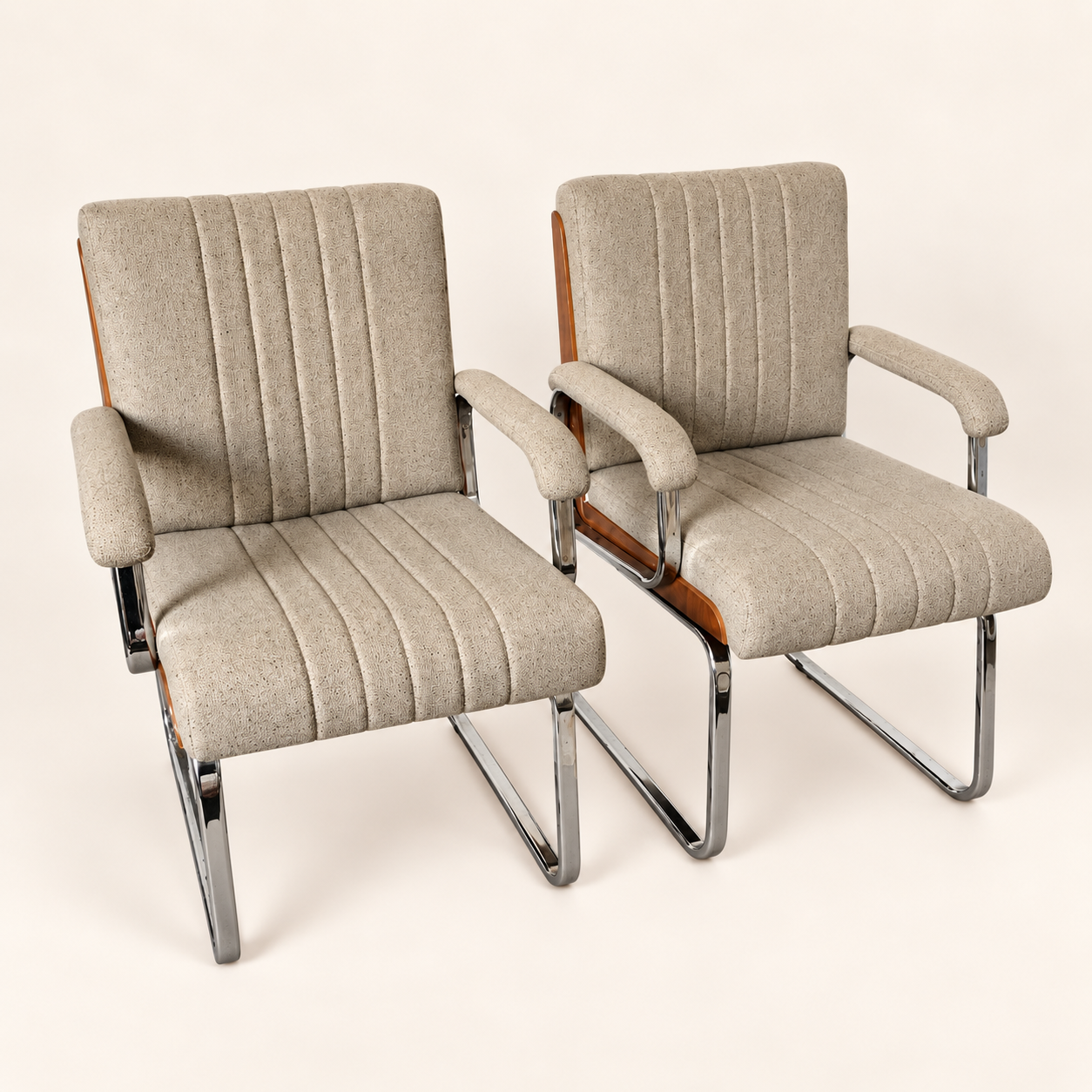 Gordon Russell Mid-Century Office Chairs after reupholstery, with taupe channelled seats and backs.