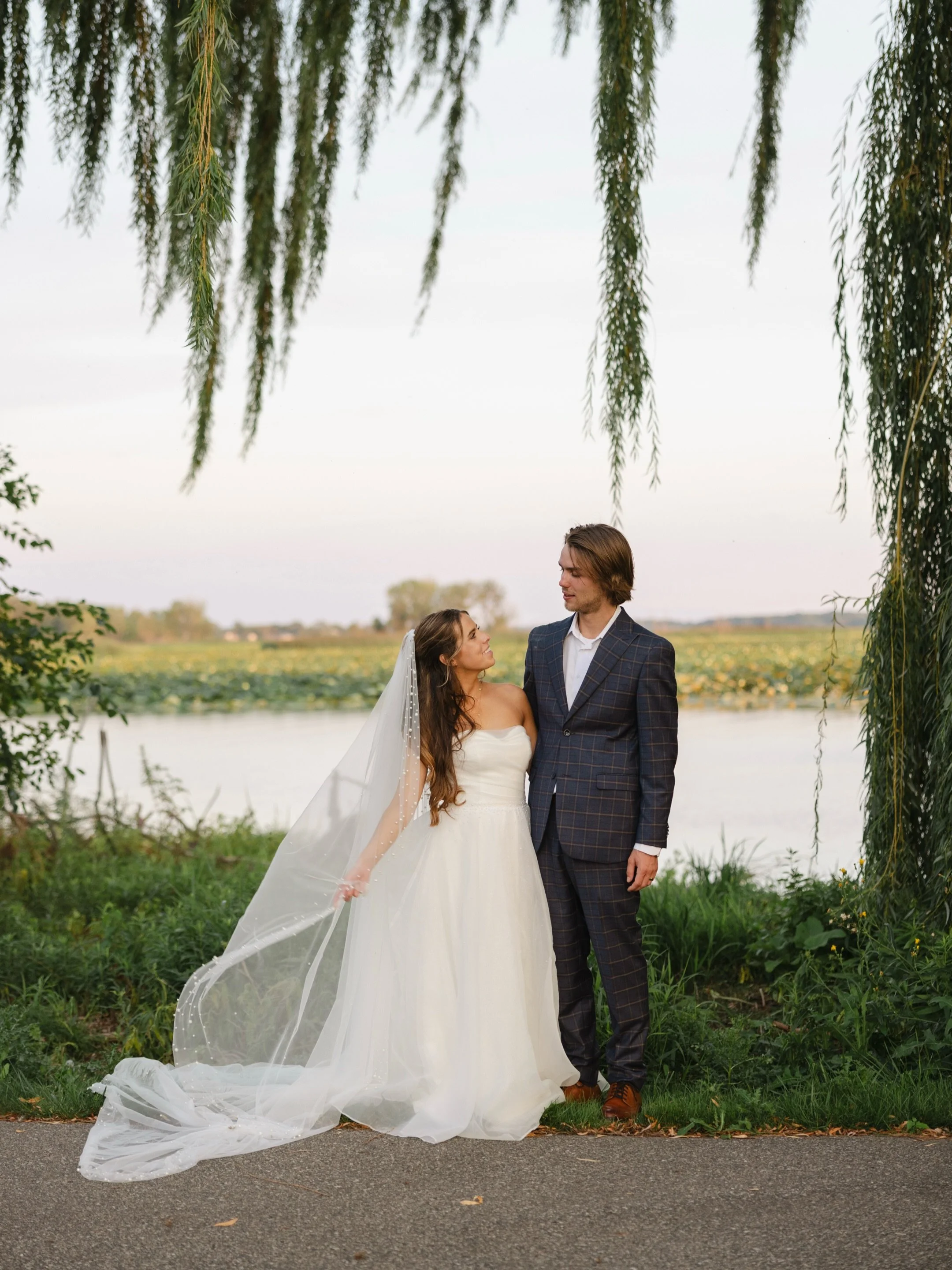 The Stevens!!
Some wedding days just feel like sunshine from beginning to end! Last August at Tanglefoot Park, Makenzi &amp; Damon celebrated the start of forever surrounded by the people they love most. Every detail was bursting with color, every la