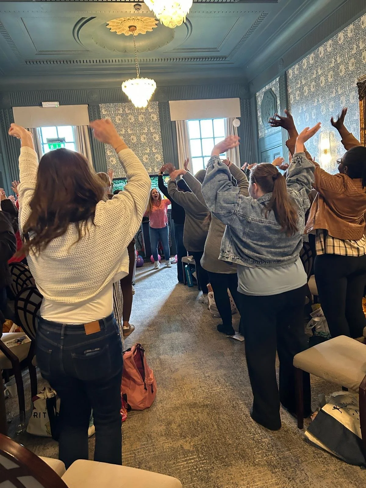 Practitioners joining a movement activity at the Fizzy to Calm conference in Coventry.