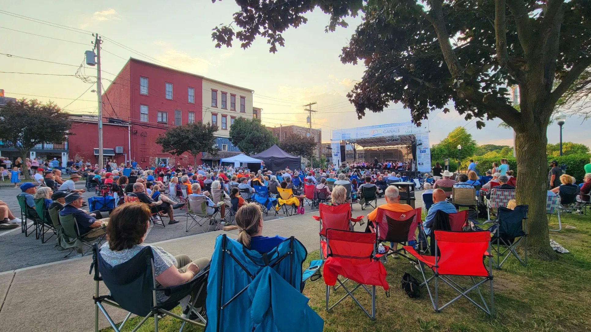  Water Music NY attendees enjoying a free concert along the Erie Canal Medina, NY | July 2, 2025 