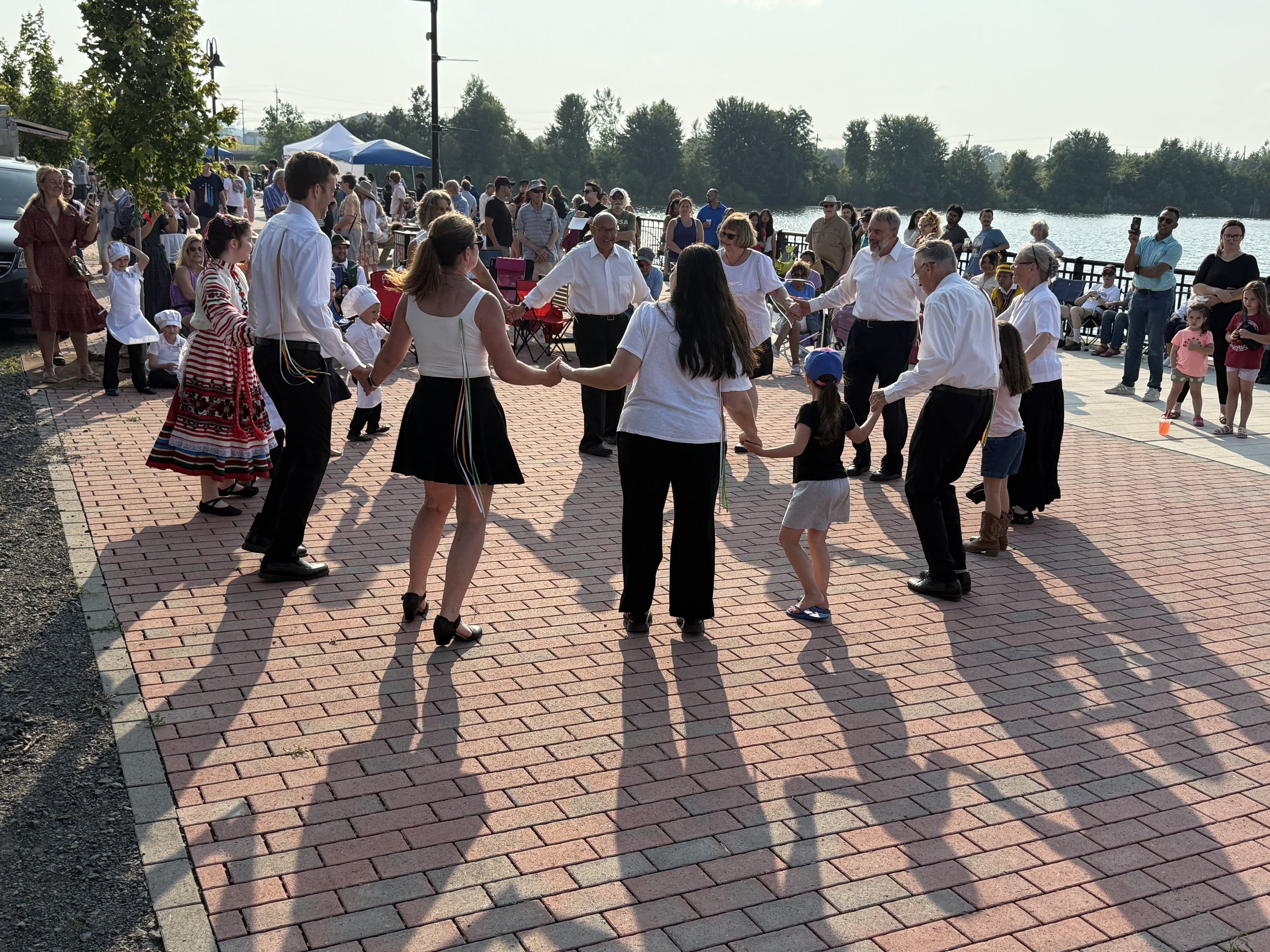  Residents of one of Utica, NY’s dance troupes participating in cultural dances for World Refugee Day on July 3, 2025 