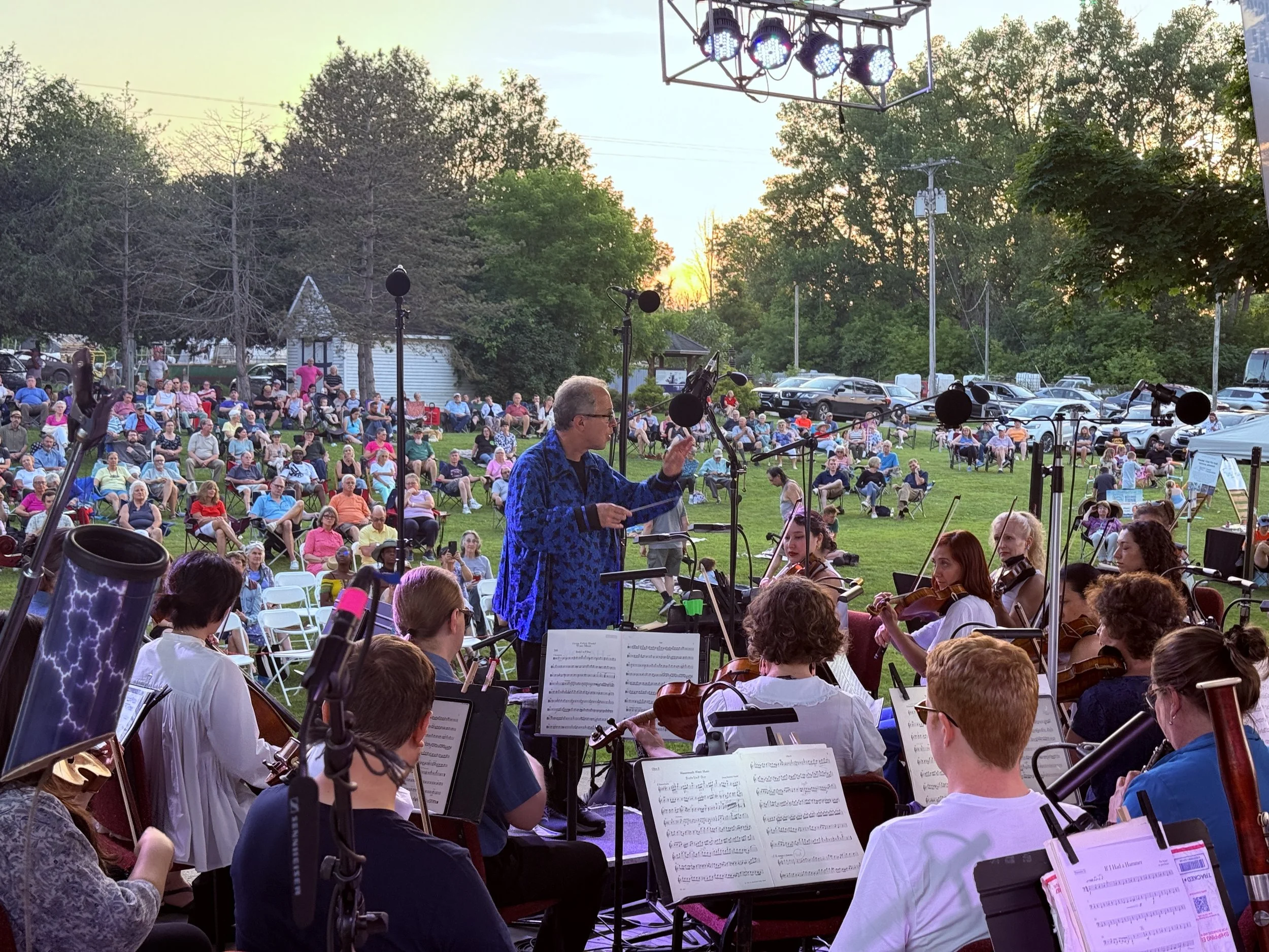  Music Director David Alan Miller leads the orchestra through the premiere of Dawn Avery’s work,  Teionontatatie  in Fort Plain, NY on July 5, 2025 