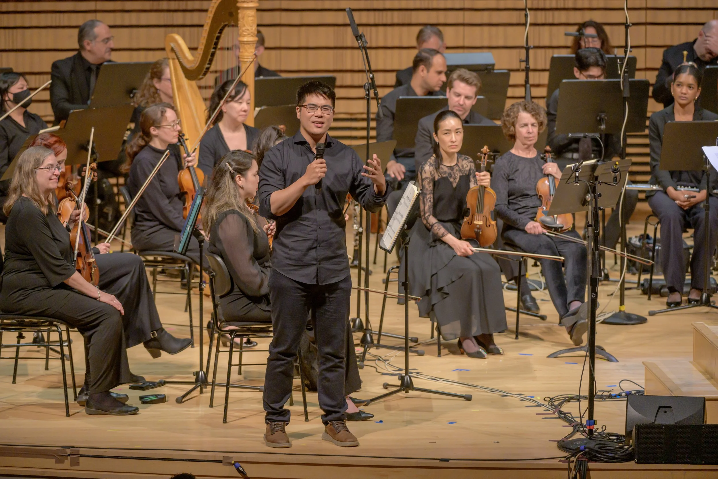  Composer Bobby Ge introduces his piece at EMPAC Concert Hall June 7, 2025 PC: Gary Gold Photography 