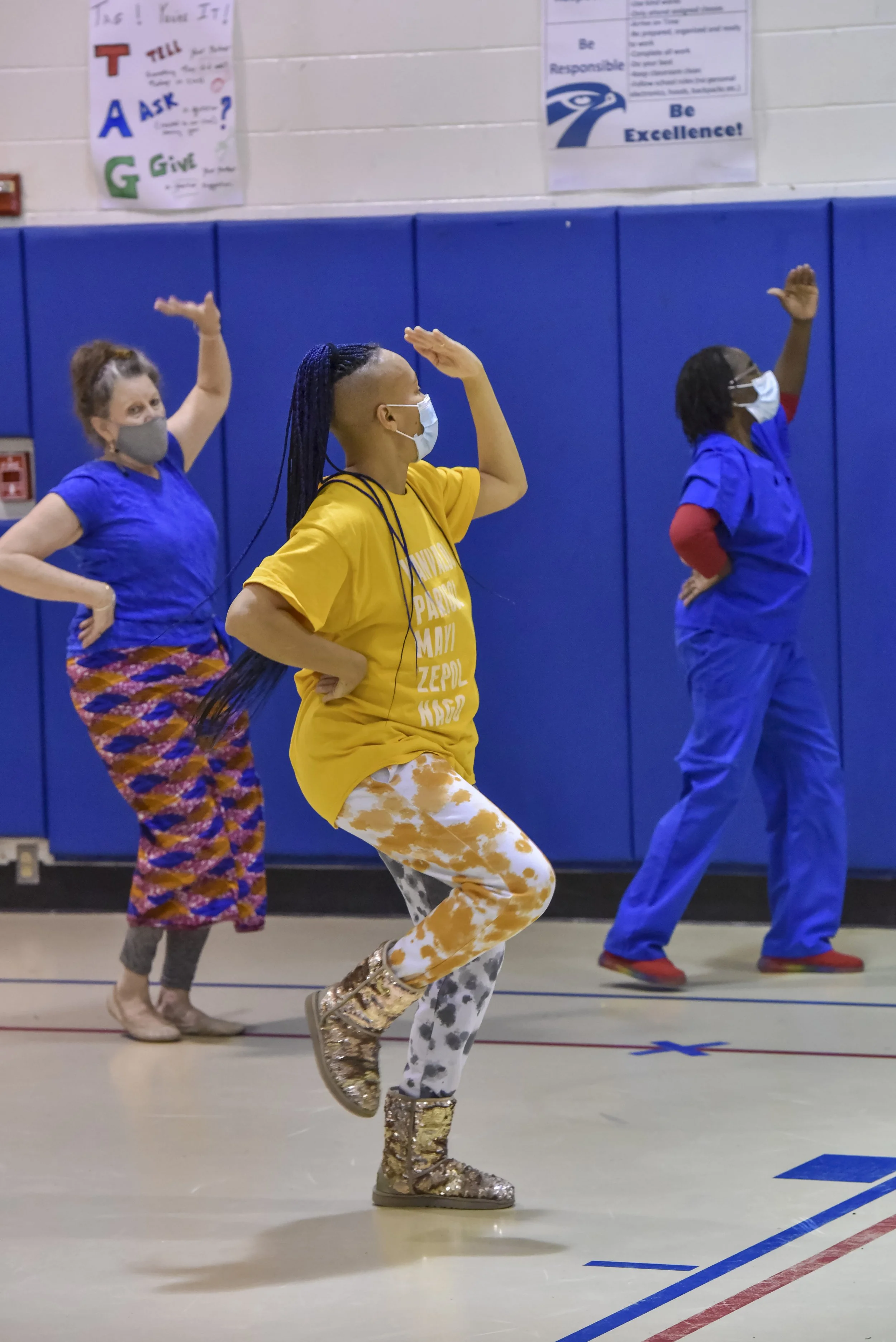  Adia dancing in sync with participants. 
