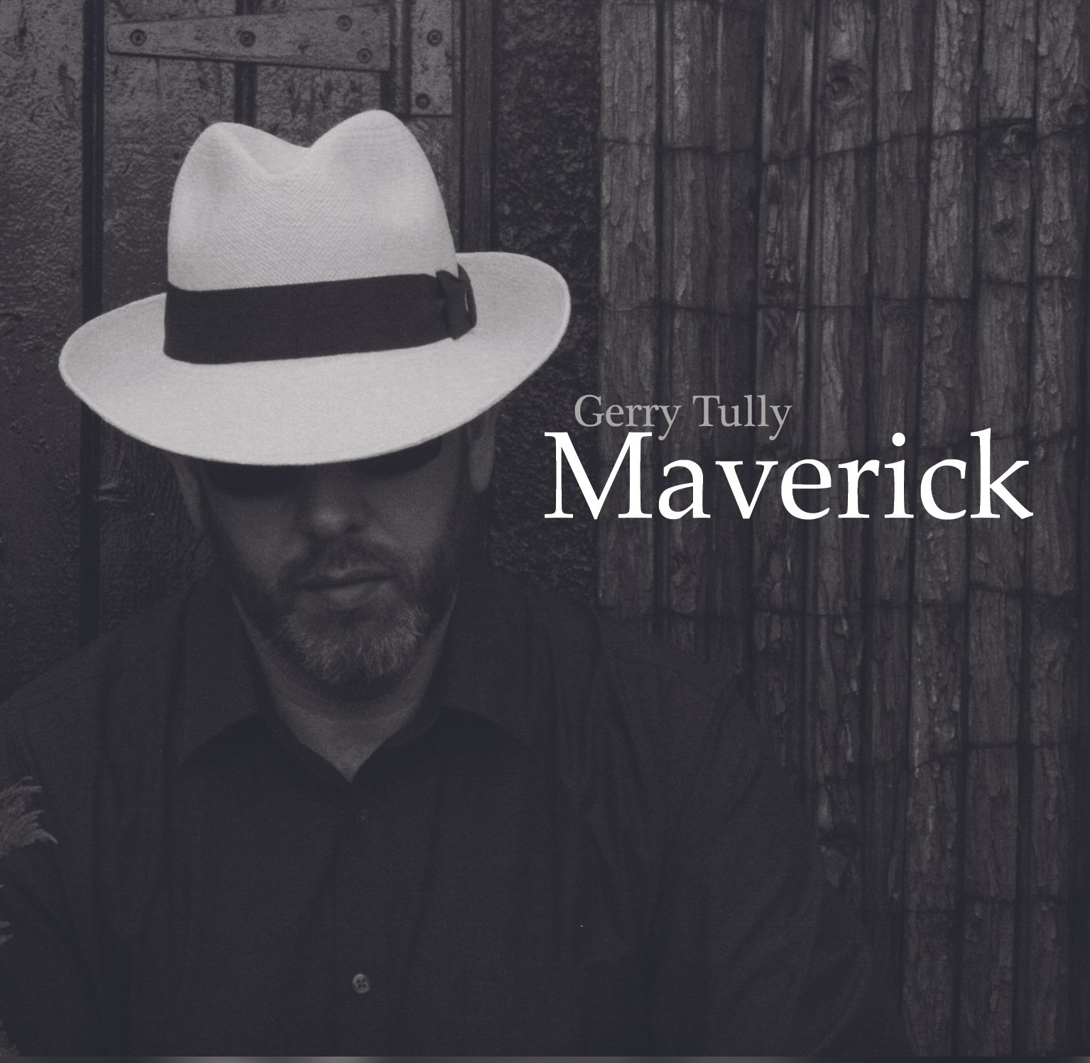 Book cover featuring a man wearing a white hat with a black band, dark background, text reading "Gerry Tully Maverick".