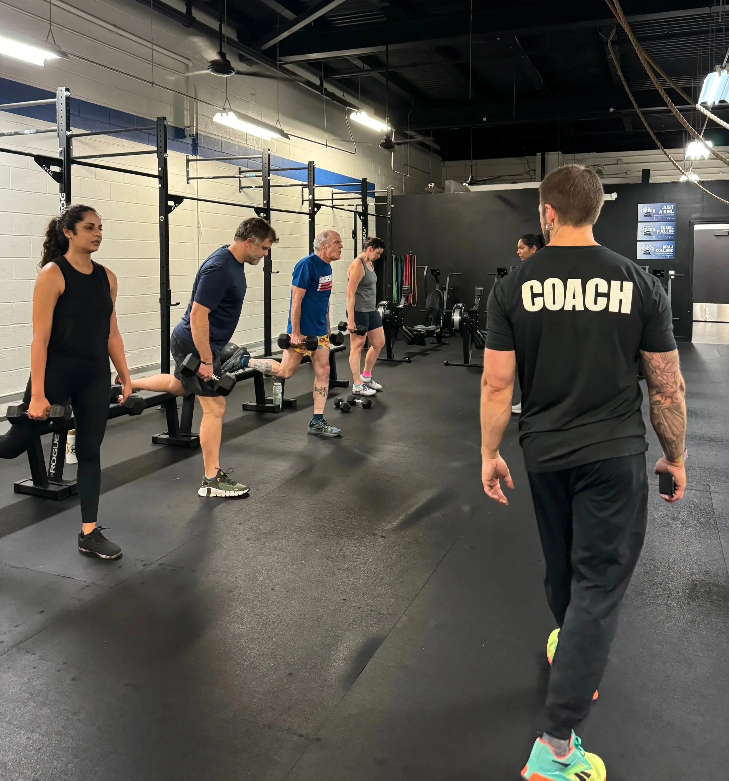 Override North group fitness class in Avon, CT with adults training under the guidance of a coach.