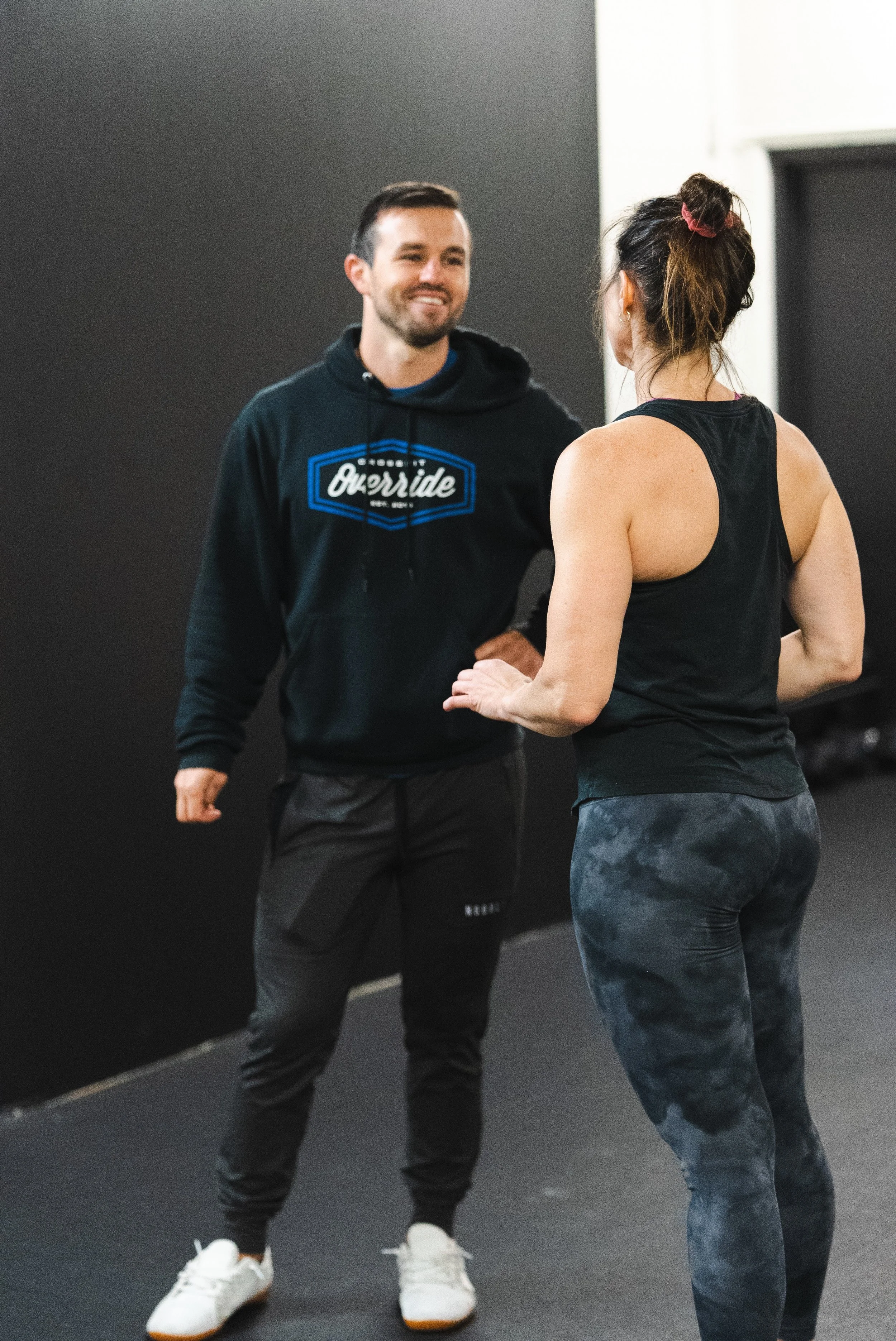 Personal training at Override North in Avon, CT with a coach working one-on-one with a member.